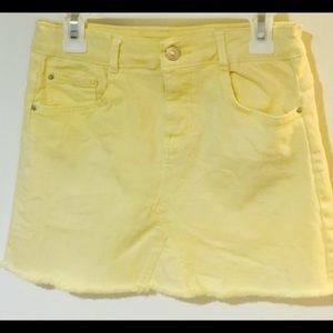 A light yellow, Zara jean skirt, from Paris, kids